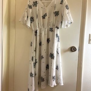 Lovely women floral dress with irregular hem